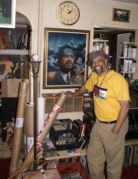 Charles Lilly with his portrait of Malcolm X